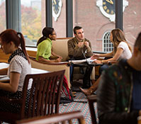 Photo of students talking. Links to Gifts of Real Estate