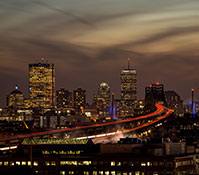 Photo of the city at night. Links to Gifts That Protect Your Assets