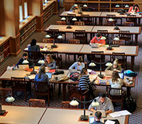 Photo of students in the library. Links to Gifts That Pay You Income
